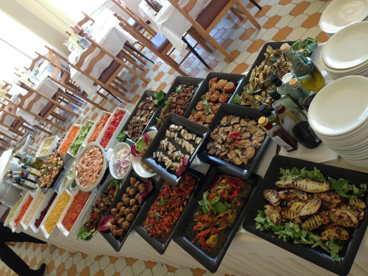 Hotel Apollonia ลิโด ดิ ซาวิโอ ภายนอก รูปภาพ